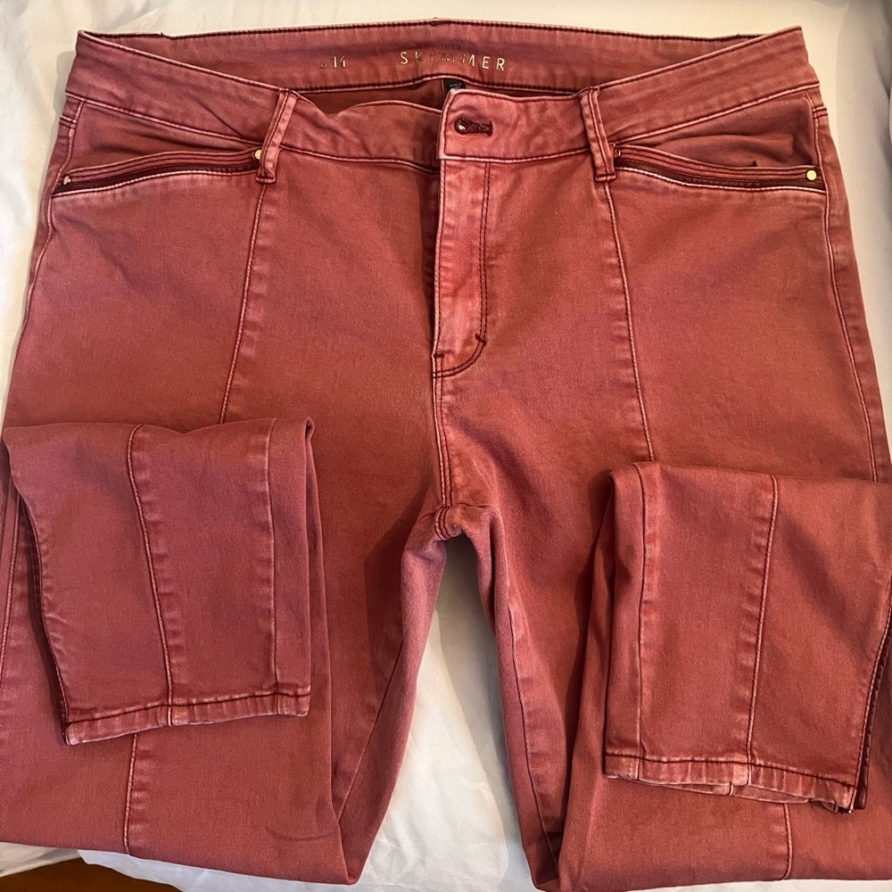 White House Black Market Dusty Rose Cropped Jeans with zippers on bottom.